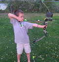 child shooting a bow