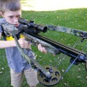 boy shooting crossbow
